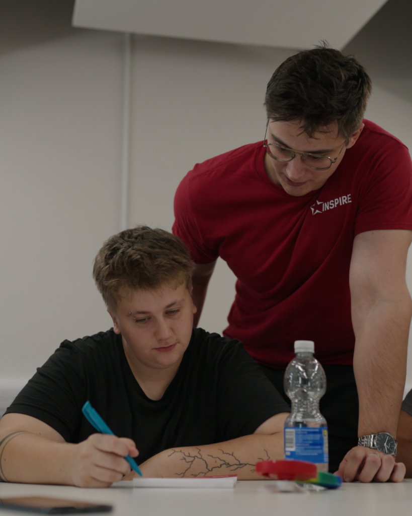 Jed, an Inspire students, works with a coach 1:1 on his aspirations for the future.