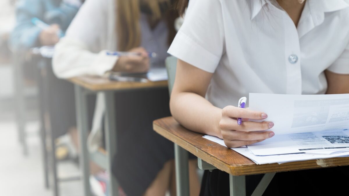 School pupils sitting at a desk